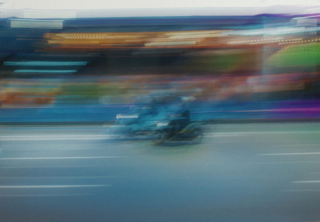 Motorbike moving with exposure to represent speed