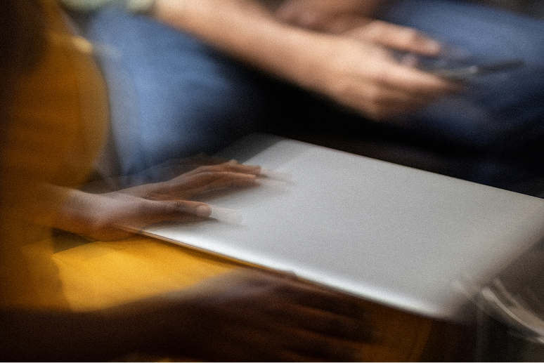 hand on computer